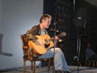 Anthony Head with guitar