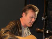 Anthony Head with guitar