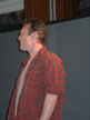Anthony Head on stage (red shirt)