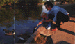 Tony and Emily Rose feeding the ducks