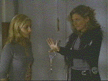 Joyce hands the handcuffs over to Buffy