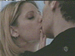 Buffy and Angel kiss in skating rink